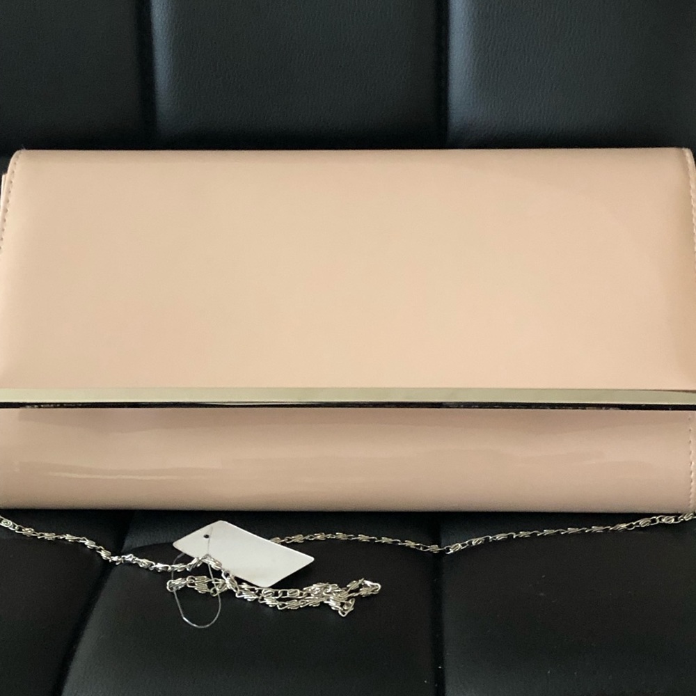 ***New w/tags*** Tan Clutch/ Crossbody. w/chain